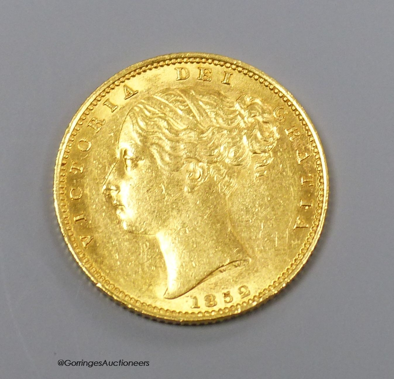 A Victoria gold sovereign 1852, wear to the edge and occasional minor nicks otherwise AEF